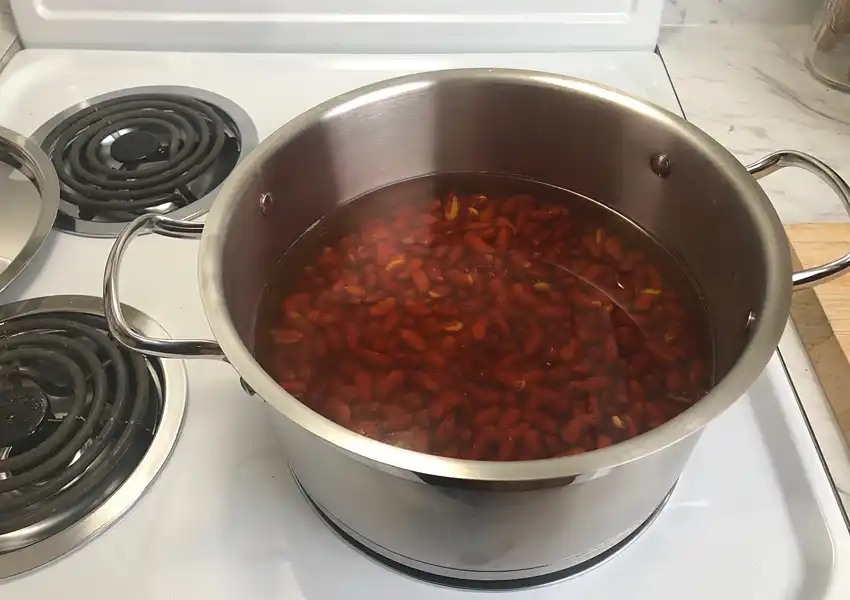 Screenshot showing the soaked red kidney beans in a pot on the stove