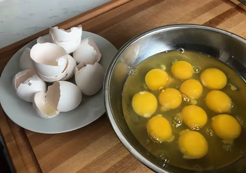 Showing a dozen eggs in a bowl ready for blending
