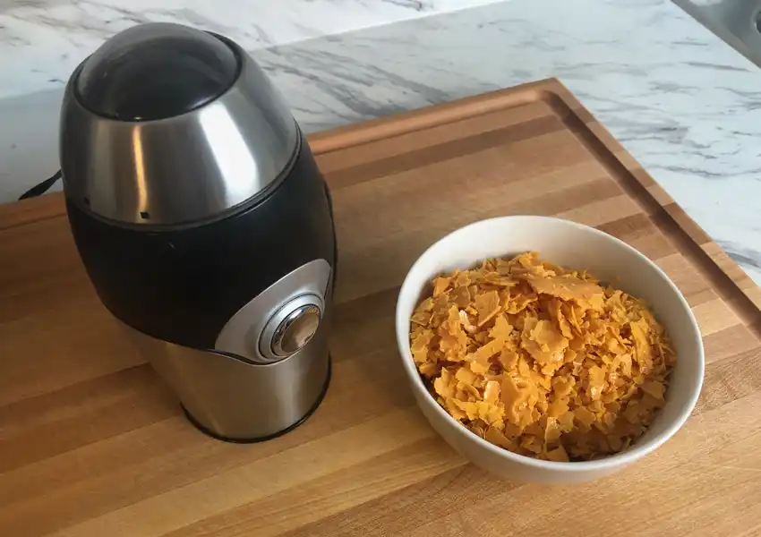 Showing broken up dried eggs for grinding into a powder
