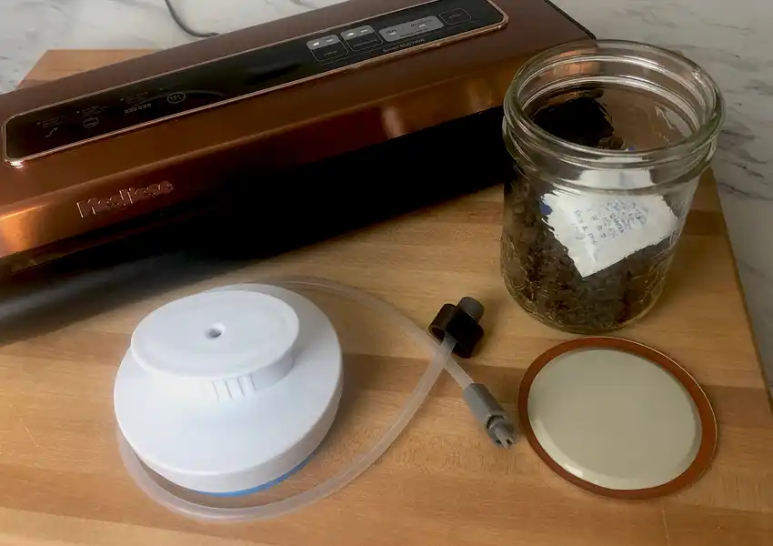 Prepping to vacuum seal ground beef in canning jars